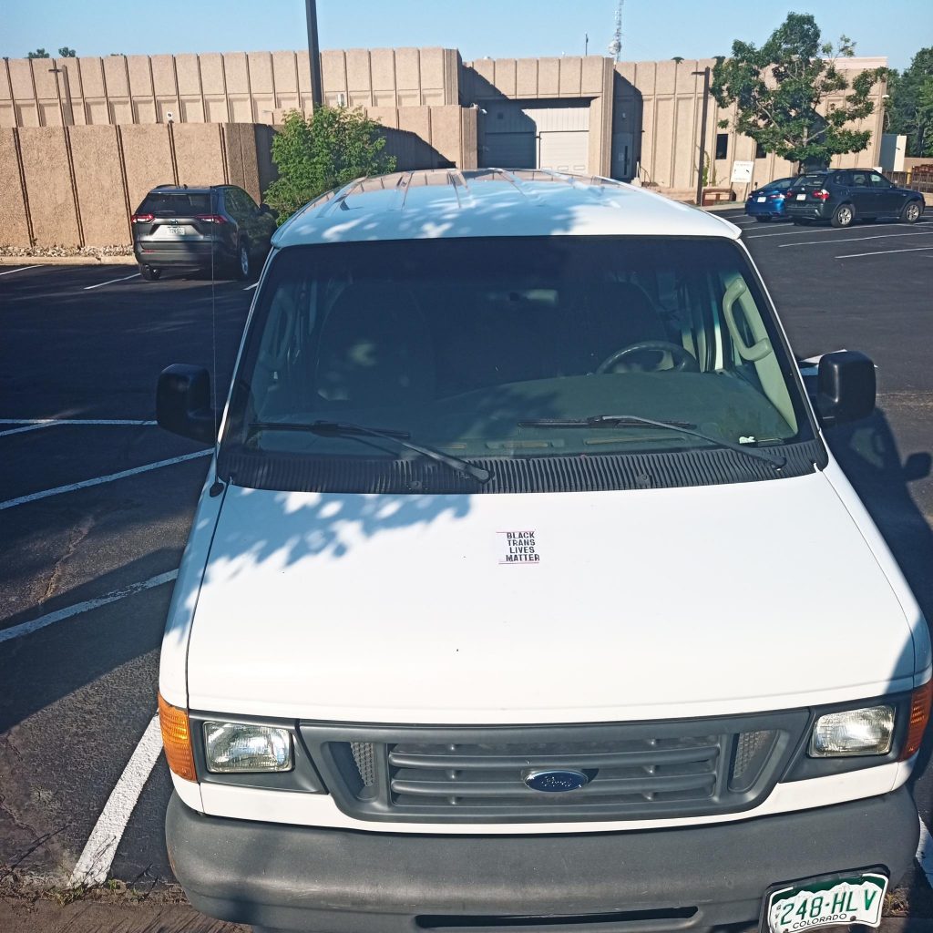 black trans lives matter sticker - city van used for work release at justice center