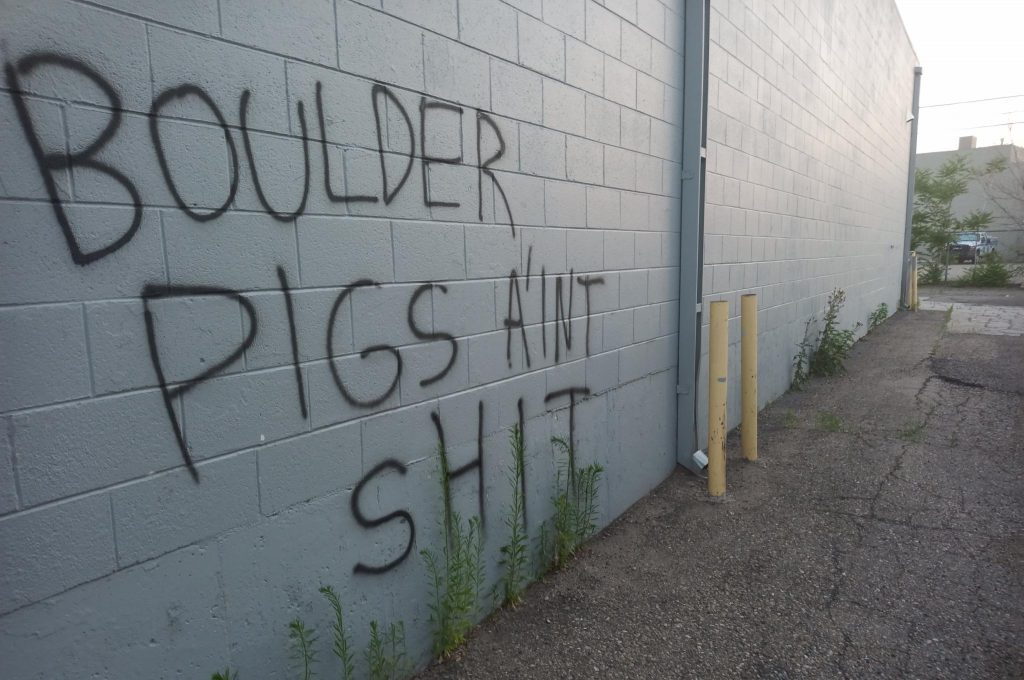 boulder pigs ain't shit with ranger in background - near boulder police department